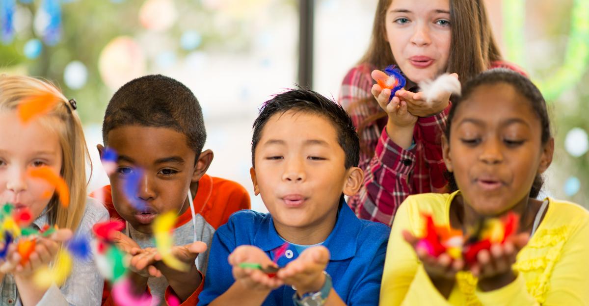Elementary age children at the art center working on a creative project.