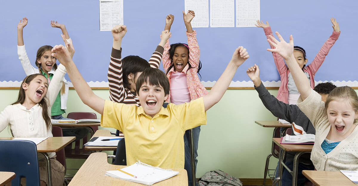 students celebrate in classroom