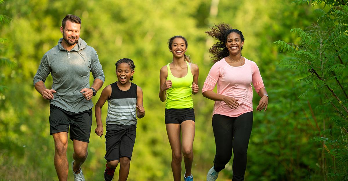 happy and fit family jogging together