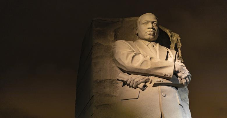 martin luther king jr statue lit up at night