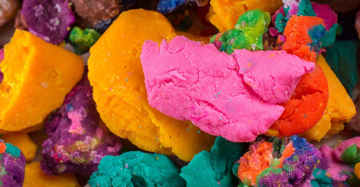dry playdough broken into colorful pieces