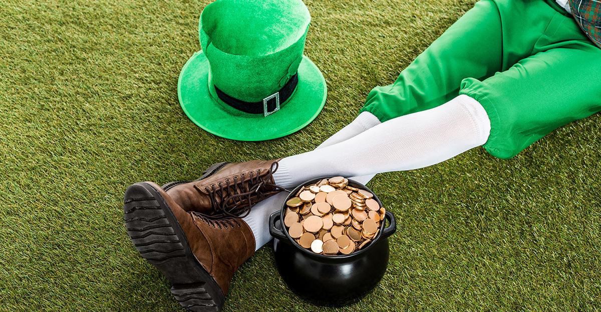 symbols of st. patrick's day with leprechaun, top hat, and gold