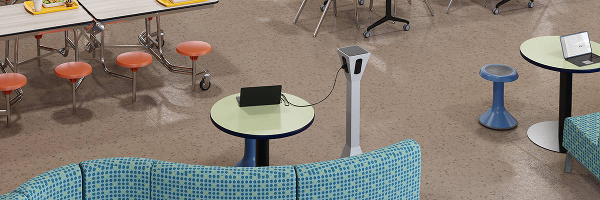 Rendering of cafeteria space design with power tower to power laptop