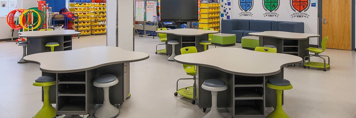 flexible learning space with tables and stools and PE equipment