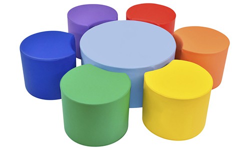 rainbow colored soft ottoman furniture around a soft table