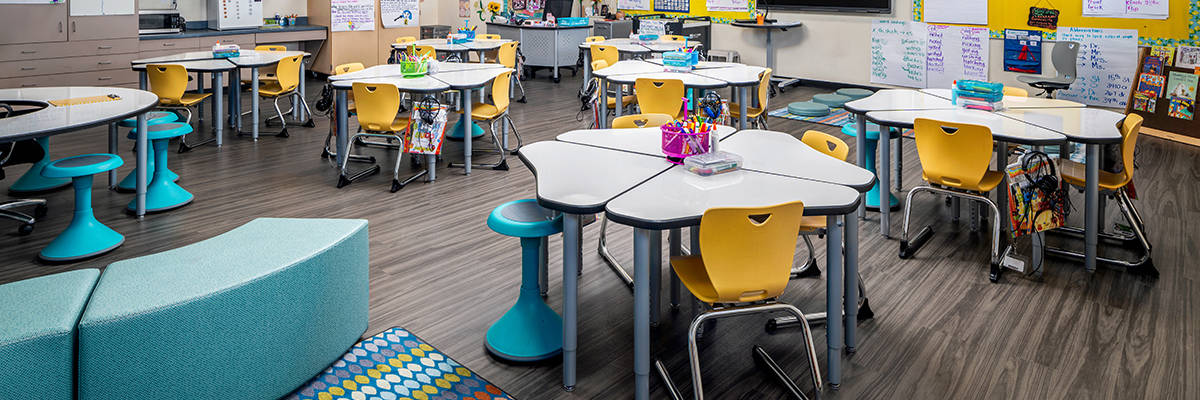 elementary classroom with configurable tables and wobble stools