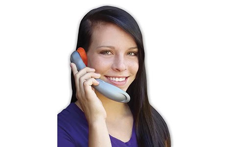 teenage girl using a phone-shaped auditory tool