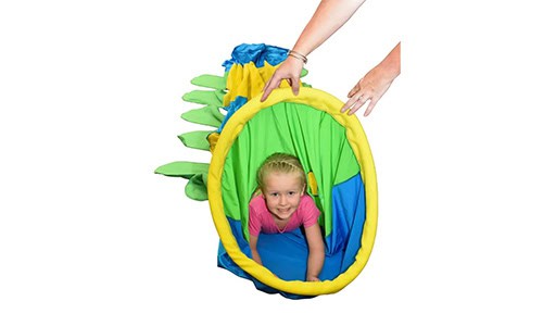 small child in a colorful tunnel toy