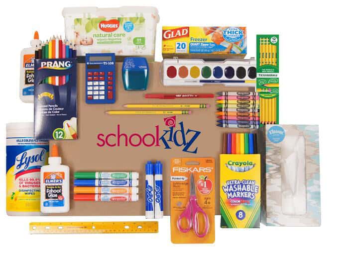 A collection of school supplies on top of a SchoolKidz box